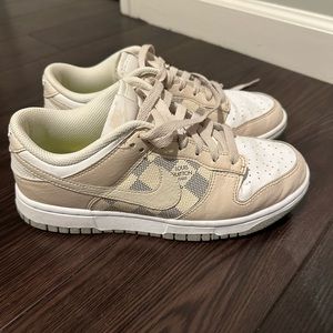 Custom onetwelve Nike dunks made with authentic LV material